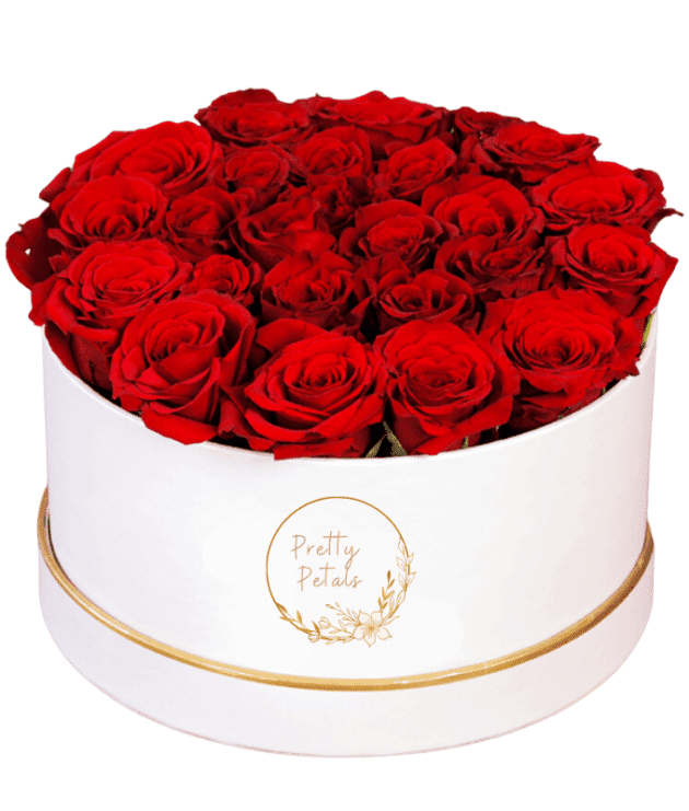 red roses arrangement in white box