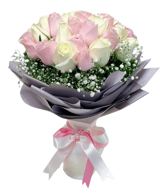 Pink and white roses arrangement in vase