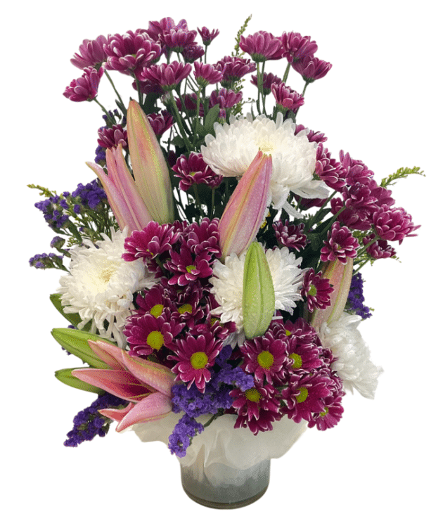 Purple Shaded chrysanthemums,white disbuds,pink lilies arrangement in vase