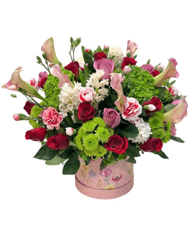 pink calla lily,purple roses,red roses,pink spray carnations,green hydrangea,white mini flowers round arrangement in pink box