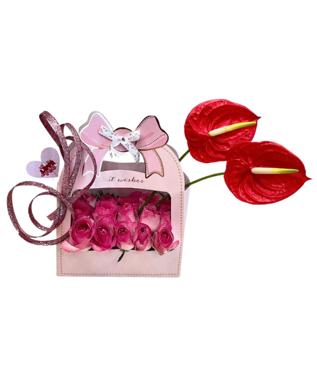 User Pink rosesin pink handle box arrangement