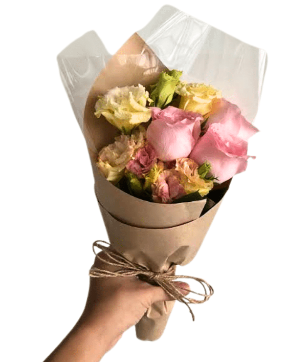 sweet pink roses and yellow roses mini handbunch wrapped in brown paper