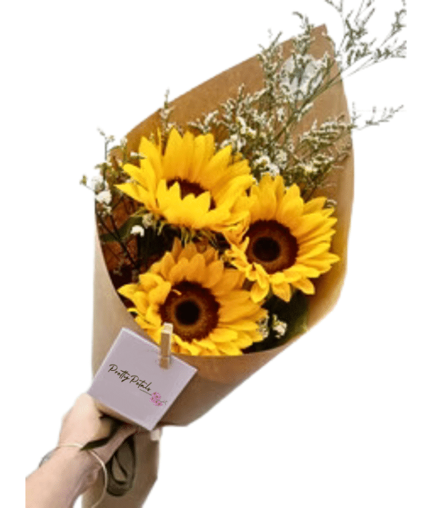 Three sunflowers handbunch wrapped in brown paper