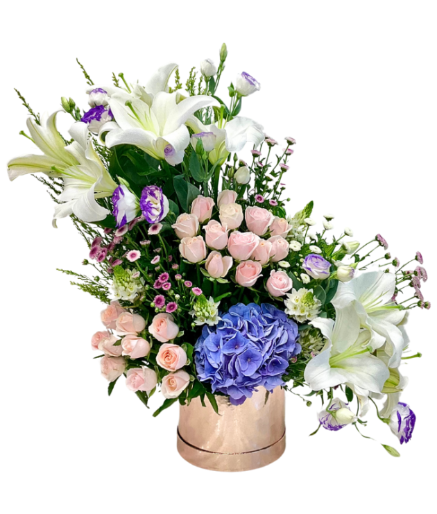 Blue hydrangea , white lilies , purple eustoma , sweet pink roses arrangement in rose gold box