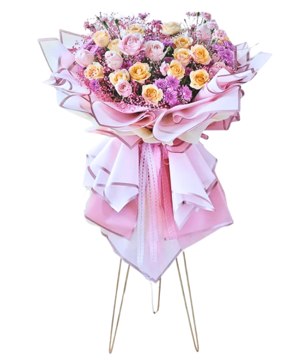 Floral bouquet on golden stand