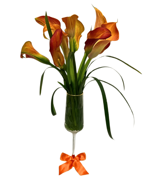 Orange Calla Lilies in wine glass arrangement